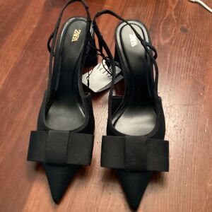 Black block heel sling backwithbows